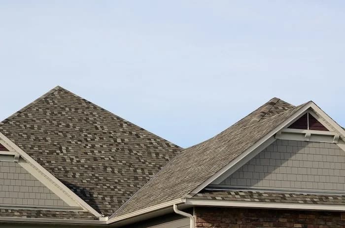 A San Diego home with tan architectural asphalt shingle gables and strong curb appeal.